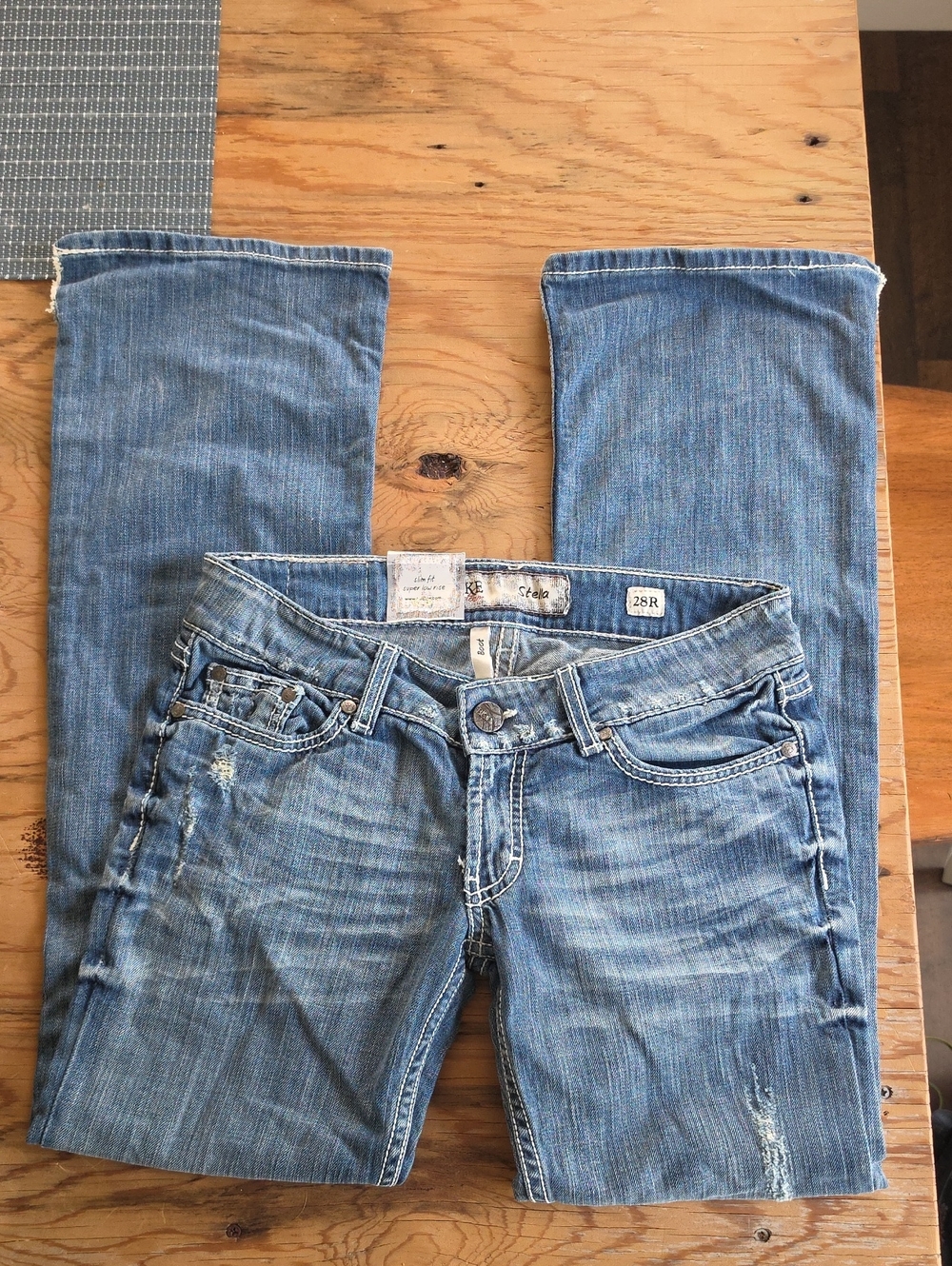 Women’s Light Blue Distressed Jeans